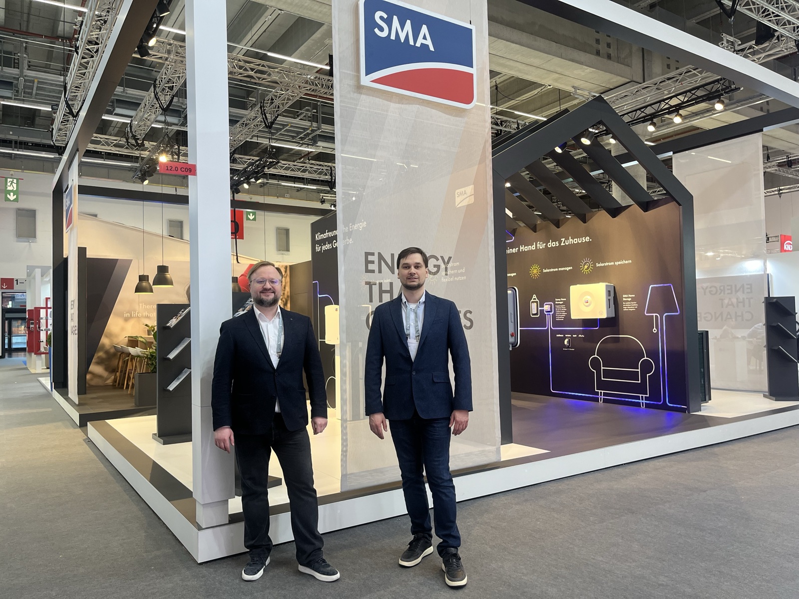 Smart Atoms team at an inverter maker's stand at Light + Building 2026