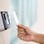 Proximity card reader door unlock Hand security man using ID