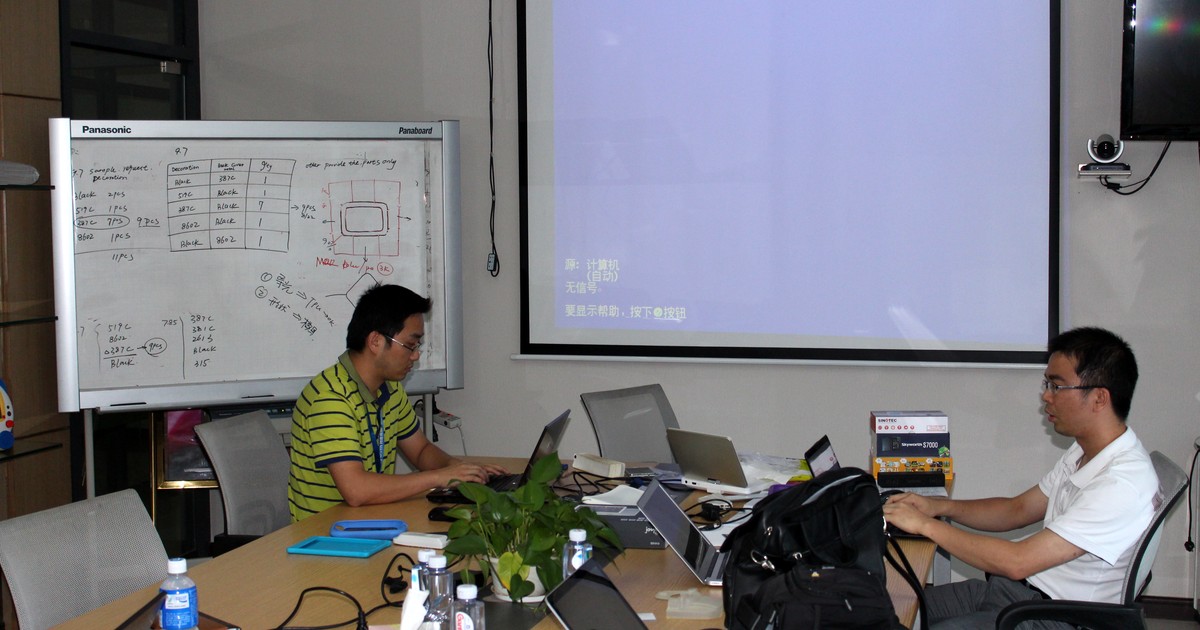 Engineering review meeting with a contract manufacturer's team