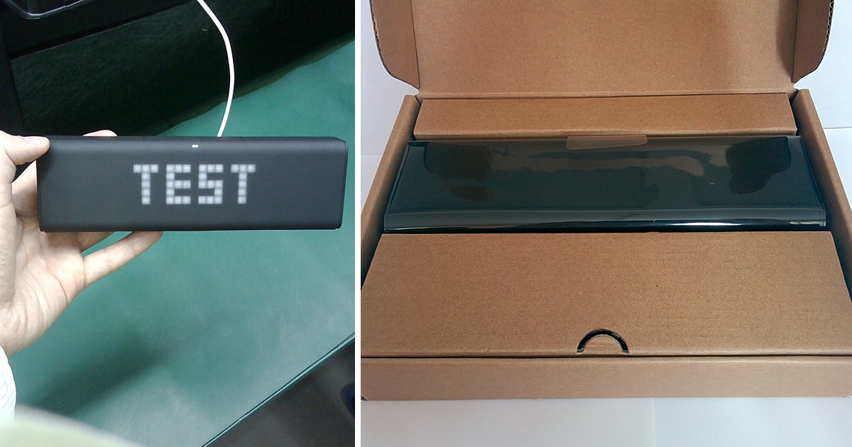 LaMetric TIME on the end-of-line test station showing TEST, and a finished unit packed in its box
