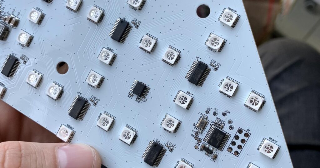 Custom LED driver PCB with RGB LEDs, driver ICs and a microcontroller