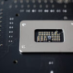 Detailed closeup of a computer processor mounted on a circui