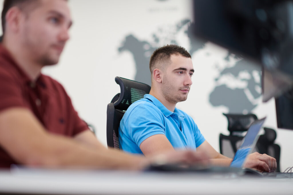Startup business, two male software developers working on co