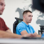 Startup business, two male software developers working on co