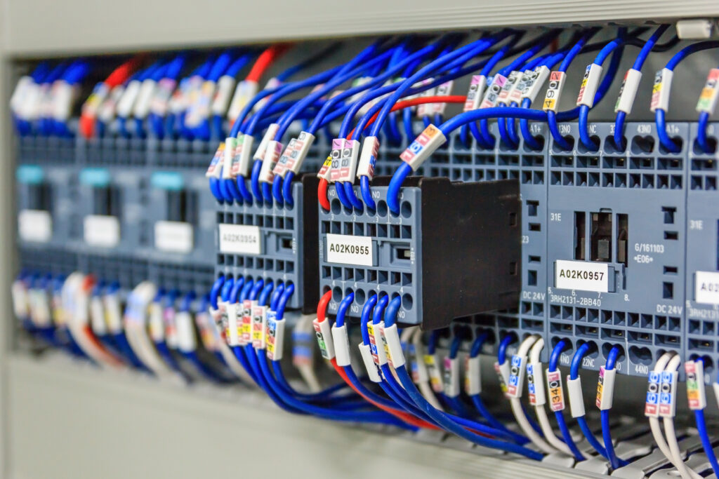 Wiring PLC Control panel with wires in cabinet for machine i