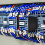 Wiring PLC Control panel with wires in cabinet for machine i